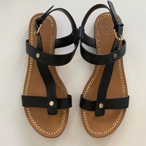 Vince Camuto black and gold chain link thong sandals.